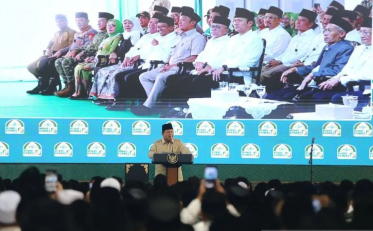 President Prabowo Subianto delivers a speech while attending the closing ceremony of the Nahdlatul Ulama (NU) National Conference of Religious Scholars and Grand Conference at the Syaichona Mohammad Cholil Islamic Institute (IAI) in Bangkalan, East Java, on June 23, 2026.