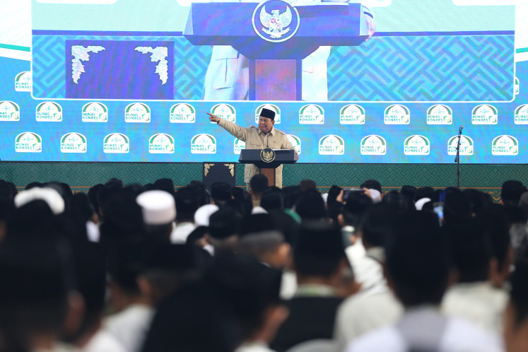 President Prabowo Subianto delivers a speech while attending the closing ceremony of the Nahdlatul Ulama (NU) National Conference of Religious Scholars and Grand Conference at the Syaichona Mohammad Cholil Islamic Institute (IAI) in Bangkalan, East Java, on June 23, 2026.