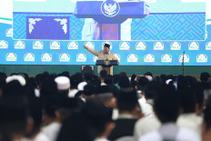 President Prabowo Subianto delivers a speech while attending the closing ceremony of the Nahdlatul Ulama (NU) National Conference of Religious Scholars and Grand Conference at the Syaichona Mohammad Cholil Islamic Institute (IAI) in Bangkalan, East Java, on June 23, 2026.