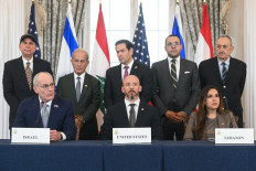Israeli Ambassador to the United States Yechiel Leiter (front left) speaks during a signing ceremony hosted by US Secretary of State Marco Rubio (back center) as State Department Chief of Staff Daniel Holler (front center) and Lebanese Ambassador to the US Nada Hamadeh (front right) at the US Department of State in Washington, DC, on June 26, 2026. Lebanon, Israel and the US on Friday signed a trilateral framework agreement aimed at paving the way for a peace deal between the two long-time Middle East adversaries.