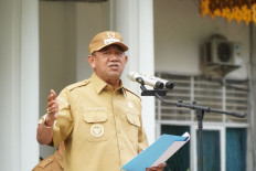 Langkat Regent Syah Afandin gives a speech on May 19, 2025, during an event in the regency administrative seat of Stabat, North Sumatra. The Corruption Eradication Commission (KPK) arrested Syah Afandin on Thursday for allegedly taking bribes from private companies awarded projects in the regency.