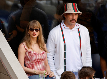 Singer Taylor Swift and Kansas City Chiefs' Travis Kelce are seen during the US Open final match between Italy's Jannik Sinner and Taylor Fritz of the United States in New York, the US on Sept. 8, 2024.