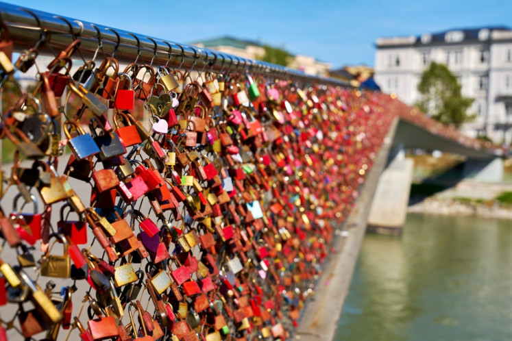Hundreds of padlocks to symbolize everlasting love, known as &ldquo;love locks&rdquo;, hang from a fence on Makartsteg Bridge over the Salzach River in Salzburg, Austria, in this undated photo.