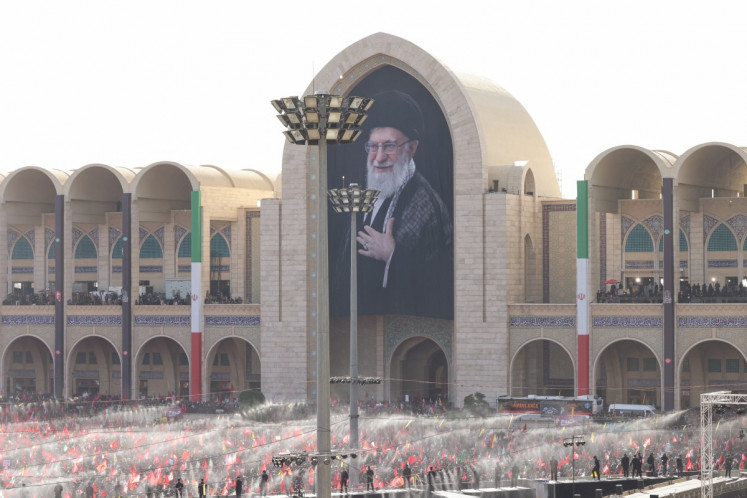 Mourners gather to pray for Iran's supreme leader Ayatollah Ali Khamenei during the second day of funeral ceremonies at the Grand Mosalla in Tehran on July 5, 2026. Khamenei ruled the Islamic republic from 1989 until he was killed aged 86 in an airstrike on the first day of the US-Israeli war with Iran on Feb. 28.