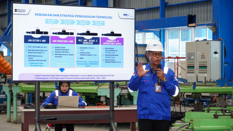 State-run shipyard PT PAL Indonesia's production manager Rear Adm (ret) Wiranto talks on July 2, 2026, about the shipyard's present and future capabilities in building submarines during a press conference at the shipyard's facilities in Surabaya, East Java. PT PAL is building two Scorpene Evolved submarines under supervision by advisors from French shipyard Naval Group. 