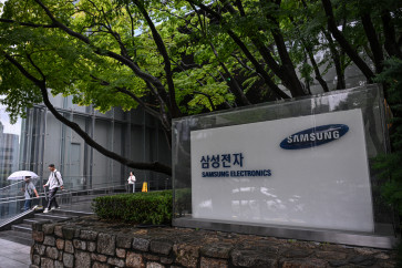 Signage of Samsung Electronics is displayed outside the company's Seocho building in Seoul on July 7, 2026.