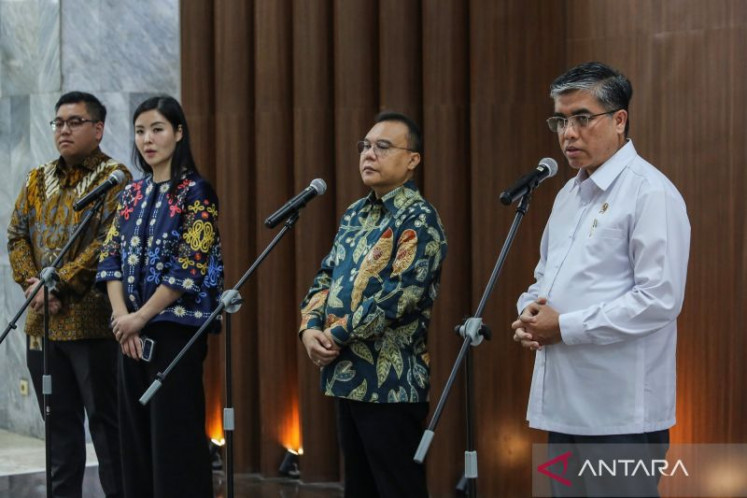 Manpower Minister Yassierli (right), Deputy House of Representatives Speaker Sufmi Dasco Ahmad (second right), Tokopedia and TikTok e-commerce Indonesia executive director Stephanie Susilo (second left) and TikTok Indonesia head of public policy Noudhy Valdryno (left) address the press on July 6 after a meeting at the House of Representatives complex in Senayan, Central Jakarta.