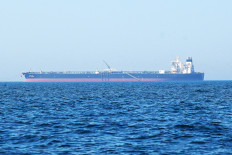 The 'Al-Yarmouk' oil tanker sails in the Arabian Gulf waters, off the coast of  Kuwait City on June 27, 2026.