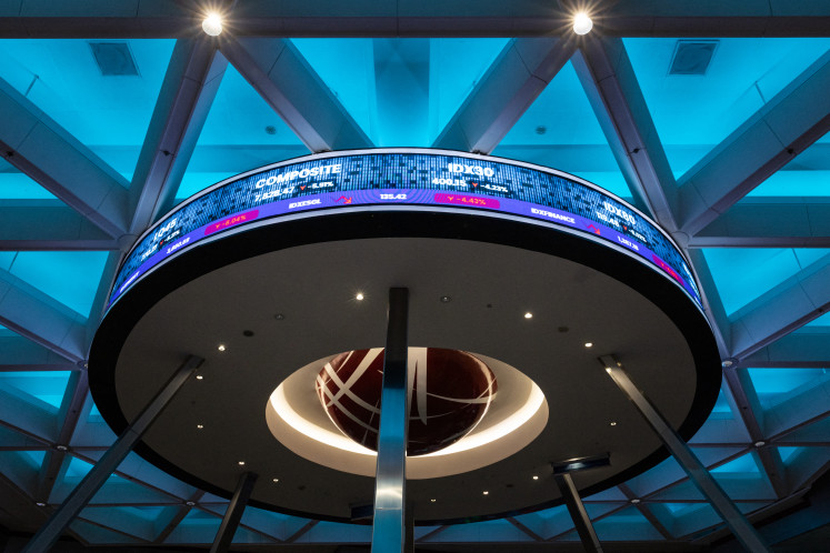 An electronic board displays stock prices at the Indonesia Stock Exchange (IDX) in Jakarta on Jan. 29, 2026.