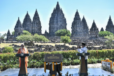 Indonesian President Prabowo Subianto, (right) and Indian Prime Minister Narendra Modi deliver remarks on July 8 during the launch of a cultural heritage conservation and restoration partnership at the Prambanan Temple complex in Sleman, Yogyakarta. The two leaders visited the UNESCO World Heritage site to review and advance bilateral cooperation on the restoration and conservation of the Prambanan temple complex. 