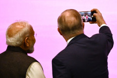 Australia&rsquo;s Prime Minister Anthony Albanese (right) takes a selfie with Indian Prime Minister Narendra Modi (left) at the Australia-India Economic Roadmap Business Reception in Melbourne on July 9, 2026. 