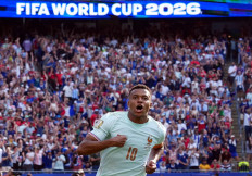 France's Kylian Mbappe celebrates after scoring his team's first goal during the FIFA World Cup quarterfinal match against Morocco at Boston Stadium in Foxborough, Massachusetts, Thursday, July 9, 2026. France defeated Morocco 2-0 to advance to the semifinals.