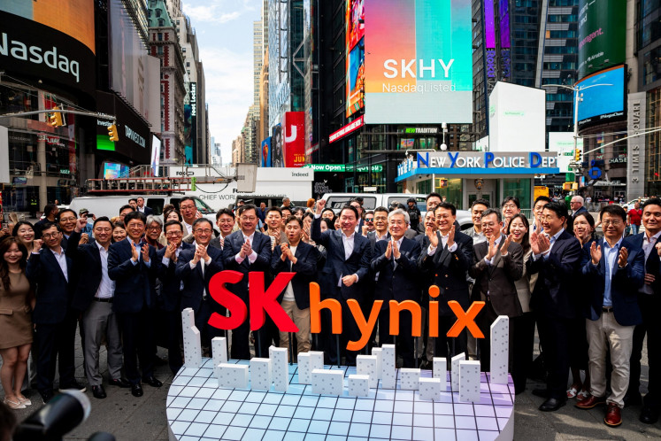 Employees of the semiconductor and memory chip company SK Hynix attend the company's opening bell ceremony at the Nasdaq market on the day of their IPO in New York City, the United States, on July 10, 2026.