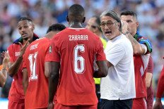 Switzerland's head coach Murat Yakin gestures during the 2026 World Cup football tournament quarter-final match between Argentina and Switzerland at the Kansas City Stadium in Kansas City on July 11, 2026.  