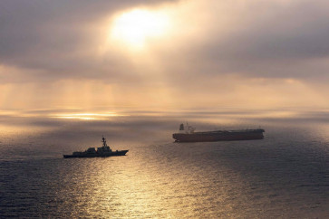 This US Navy handout photo released on May 8, 2026 by US Central Command Public Affairs, shows the Arleigh Burke-class guided-missile destroyer USS Rafael Peralta (DDG 115) implementing a maritime blockade against the Iran-flagged crude oil tanker vessel Herby while the latter was attempting to sail toward an Iranian port, on April 24, 2026.