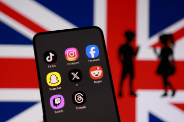 Union Jack flag, social media app icons and a silhouette of children are seen in this illustration taken June 15, 2026.