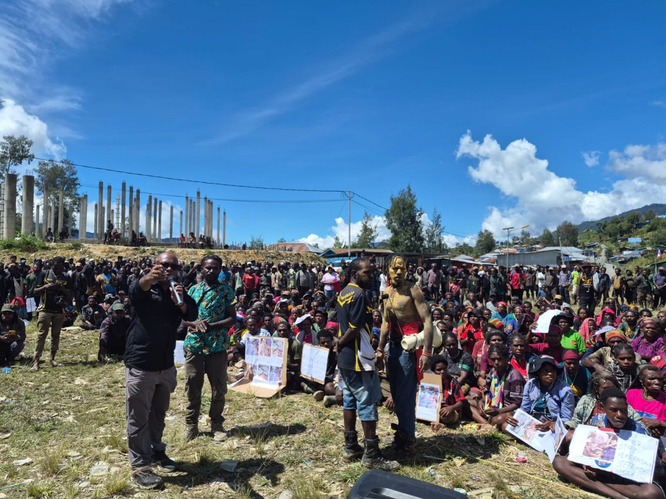 Dozens of Papuans gather on July 4, 2026 at the Sugapa field in Intan Jaya regency, Central Papua to meet with representatives from the National Commission on Human Rights (Komnas HAM) following the deadly clash between the Indonesian Military (TNI) and a separatist group in the district two days earlier. (Courtesy of the National Commissions on Human Rights.