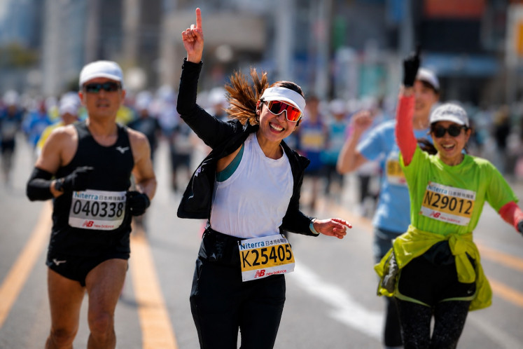 Running the Nagoya Women's Marathon in Japan, March 2025.