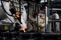 Workers smelt silver ingots known as &ldquo;the pig sows&rdquo; at the Precious Metals Division of the Glogow smelter in southwestern Poland, owned by KGHM, the metallurgical giant in the country, on March 24, 2026. 