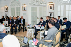 Thailand's Foreign Minister Sihasak Phuangketkeow and Myanmar's Foreign Minister Tin Maung Swe attend an informal meeting on July 12 with ASEAN Foreign Ministers in Bangkok.