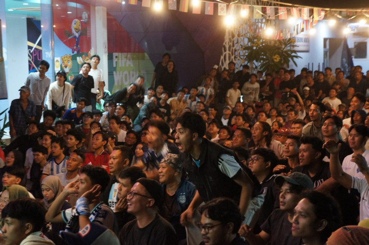An Argentina supporter reacts during the public screening of the World Cup 2026 semifinal between England and Argentina at the headquarters of state-owned broadcaster TVRI in Senayan, Central Jakarta, on July 16, 2026. 