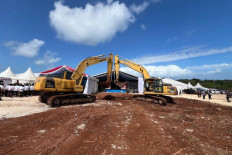 Heavy equipment is used at the groundbreaking site for the Abadi Masela LNG project in Tanimbar Islands, Maluku, on July 16, 2026.