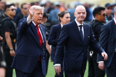 FIFA President Gianni Infantino (right) and United States President Donald Trump arrive for the final ceremony after the 2026 World Cup soccer tournament final match between Spain and Argentina at the New York/New Jersey Stadium in East Rutherford, the United States on July 19, 2026.