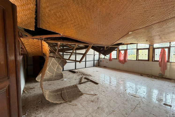The collapsed roof of a classroom at SDN 1 Anturan is seen on Monday in Anturan village, Buleleng district, Buleleng regency, Bali.