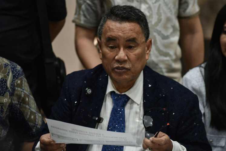 Lawyer Hotman Paris gestures while speaking at a press conference on a corruption case implicating his client, former assistant attorney general for special crimes Febrie Adriansyah, at the Attorney General&rsquo;s Office (AGO) headquarters in Jakarta on July 17, 2026.