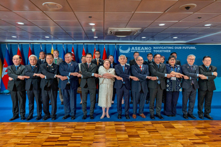 (Front row L-R) Myanmar Permanent Secretary Hau Khan Sum, Malaysia's Secretary-General of the Ministry of Foreign Affairs Amran Mohamed Zin, Thailand's Deputy Prime Minister and Foreign Minister Sihasak Phuangketkeow, East Timor's Foreign Minister Bendito dos Santos Freitas, Vietnam's Deputy Foreign Minister Dang Hoang Giang, Philippine Foreign Secretary Theresa Lazaro, Singapore's Permanent Secretary of Foreign Affairs Albert Chua, Brunei's Foreign Minister Erywan Yusof, Cambodia's Deputy Prime Minister and Foreign Minister Prak Sokhonn, Indonesia's Director General for ASEAN Cooperation Ina Hagniningtyas Krisnamurthi, Laos Foreign Minister Thongsavanh Phomvihane and ASEAN Secretary-General Kao Kim Hourn pose for a photo with representatives from the ASEAN Intergovernmental Commission on Human Rights (AICHR) Representatives during the ASEAN Foreign Ministers' Meeting on July 20 at the Philippine International Convention Center in Pasay, Metro Manila. 