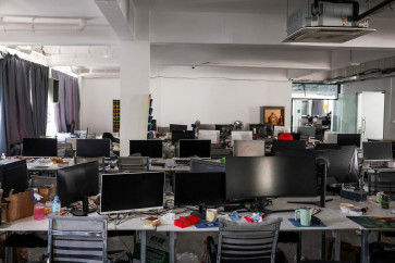 Computer monitors are kept on desks inside a workstation at a compound in O'Smach that the Thai military said was used for scam operations, at the Chong Chom-O'Smach border crossing, after clashes between Thailand and Cambodia in December 2025, in Samraong, Oddar Meanchey province, Cambodia, March 6, 2026.