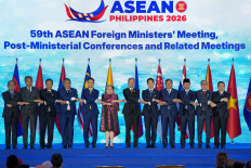 (From left to right) Myanmar's Permanent Secretary of the Ministry of Foreign Affairs Hau Khan Sum, Malaysian Foreign Minister Mohamad Hasan, Thailand's Vice Foreign Minister Vijavat Isarabhakdi, East Timor's Foreign Minister Bendito dos Santos Freitas, Vietnam's Deputy Foreign Minister Dang Hoang Giang, Philippine Foreign Secretary Theresa Lazaro, Singapore's Foreign Minister Vivian Balakrishnan, Brunei's Foreign Minister Prince Abdul Mateen Bolkiah, Cambodia's Foreign Minister Prak Sokhonn, Foreign Minister Sugiono, Laos' Foreign Minister Thongsavanh Phomvihane and ASEAN Secretary-General Kao Kim Hourn pose for a group photo during the opening ceremony of the 59th ASEAN Foreign Ministers' Meeting (AMM) at the Philippine International Convention Center in Manila, on July 21, 2026.