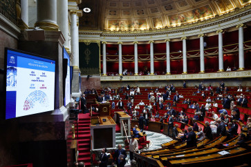 A screen shows the result of a vote on the bill that aims to ban social media access for children under the age of 15, at the National Assembly in Paris, France, July 21, 2026.