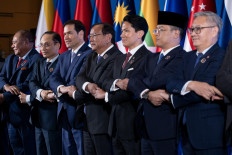 Timor Leste's Foreign Minister Bendito dos Santos Freitas, Vietnam Foreign Minister Le Hoai Trung, US Secretary of State Marco Rubio, Cambodia's Deputy Prime Minister and Foreign Minister Prak Sokhonn, Brunei Foreign Minister Abdul Mateen Bolkiah, Indonesia's Foreign Minister Sugiono, Laos Foreign Minister Thongsavanh Phomvihane, Malaysia's Foreign Minister Mohamad Hasan, Myanmar Permanent Secretary Hau Khan Sum and ASEAN Secretary-General Kao Kim Hourn join hands during the Association of Southeast Asian Nations (ASEAN) Foreign Ministers' Meeting in Pasay, Metro Manila on July 22, 2026. 