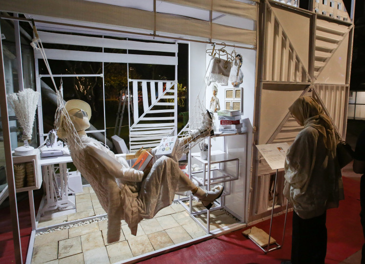 Art in the park: Visitors view artworks on July 17, 2026, at Jakarta Provoke! 2026 in Menteng Park, South Jakarta. The outdoor exhibition features 25 works by 25 artists, curated by 25 curators.