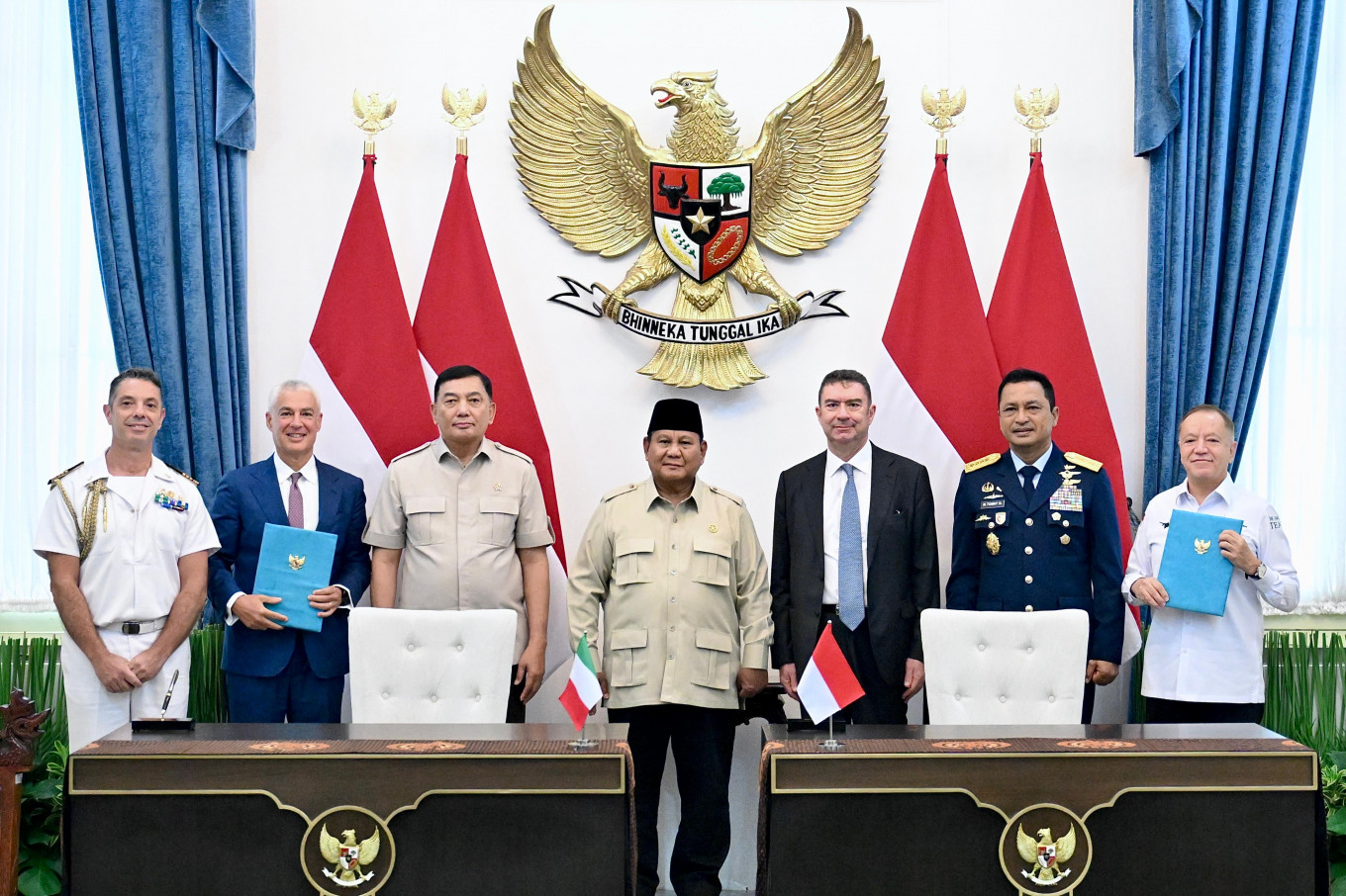 President Prabowo Subianto (center), flanked by Defense Minister Sjafrie Sjamsoeddin (third left) and Italian Ambassador to Indonesia Jakarta Roberto Colamine (third right), poses during a signing ceremony at the State Palace in Central Jakarta, in this undated photo provided by Leonardo on July 21, 2026. Also attending the ceremony were (from left) Italian Defense Attache in Jakarta navy Capt. Giovanni Marilli, Italian aerospace company Leonardo CEO Lorenzo Mariani, Indonesian Air Force chief of staff Air Chief Marshal M. Tonny Harjono and PT E-System Solutions Indonesia president director Habib Boukharouba.