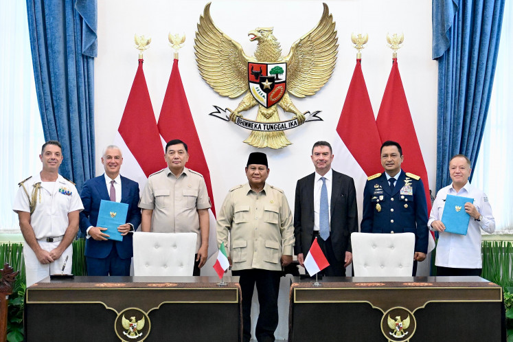 President Prabowo Subianto (center), flanked by Defense Minister Sjafrie Sjamsoeddin (third left) and Italian Ambassador to Indonesia Jakarta Roberto Colamine (third right), poses during a signing ceremony at the State Palace in Central Jakarta, in this undated photo provided by Leonardo on July 21, 2026. Also attending the ceremony were (from left) Italian Defense Attache in Jakarta navy Capt. Giovanni Marilli, Italian aerospace company Leonardo CEO Lorenzo Mariani, Indonesian Air Force chief of staff Air Chief Marshal M. Tonny Harjono and PT E-System Solutions Indonesia president director Habib Boukharouba.