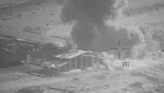 Smoke rises from an explosion at an unknown location, during what the United States Central Command (CENTCOM) says are strikes on Iranian military targets, in this screengrab taken from a handout video released on July 23, 2026.