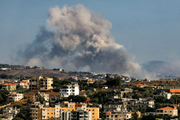 Smoke rises following an Israeli controlled-explosion on the village of Kfartibnit as seen from Nabatieh in southern Lebanon on July 29, 2026. While violence has declined since the signing of a preliminary US-Iran deal in June and the Lebanon-Israel agreement, Lebanon continues to report intermittent Israeli strikes and artillery shelling on the south. 