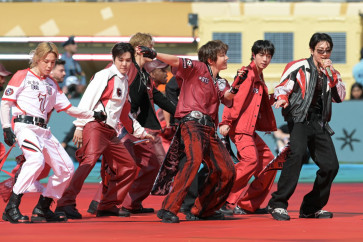Members of the South Korean boy band BTS perform during the 2026 World Cup soccer tournament final match between Spain and Argentina at the New York/New Jersey Stadium in East Rutherford on July 19, 2026. 