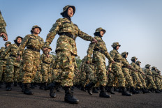 Manager candidates of the Red and White Cooperatives march in full camo outfits on July 31, 2026, prior to attending the closing ceremony for the Defense Ministry&rsquo;s Bachelor of Indonesian Development Drivers (SPPI) degree program at Halim Perdanakusuma Air Force Base in East Jakarta.
