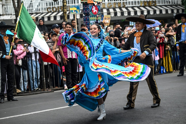 Dancers from Mexico dance during the Surabaya Cross Culture International Folk Art Festival (SCCIFAF) on July 16, 2023, in Surabaya, East Java.