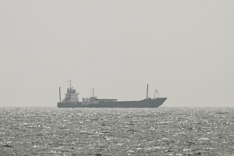 A vessel is anchored off the coast of Sharjah in the United Arab Emirates on August 3, 2026. 