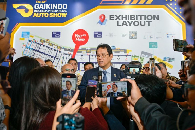 Finance Minister Purbaya Yudhi Sadewa speaks to reporters during a doorstep interview after attending the Gaikindo Indonesia International Auto Show (GIIAS) 2026 in Tangerang, Banten, on Aug. 4, 2026. 