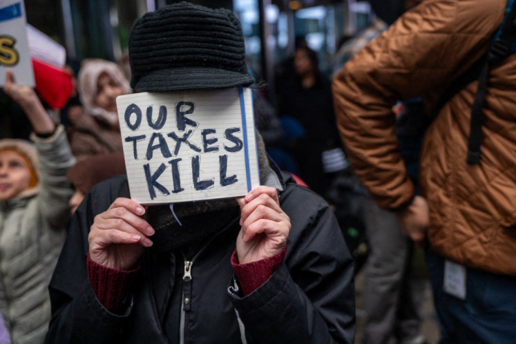 People join an Al Quds Day rally in New York&rsquo;s Times Square on March 13, 2026, to express support for Palestinians and object to the United States and Israel&rsquo;s strikes on Iran.