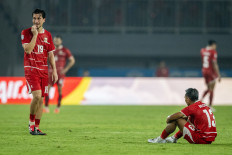 Indonesia's wingers Thom Haye (left) and Beckham Putra (right) react disappointedly after their defeat against Vietnam in the Group A match of the ASEAN Championship 2026 at the Pakansari Stadium in Bogor regency, West Java on Aug. 3, 2026. Vietnam beat Indonesia 3-0 in the match.