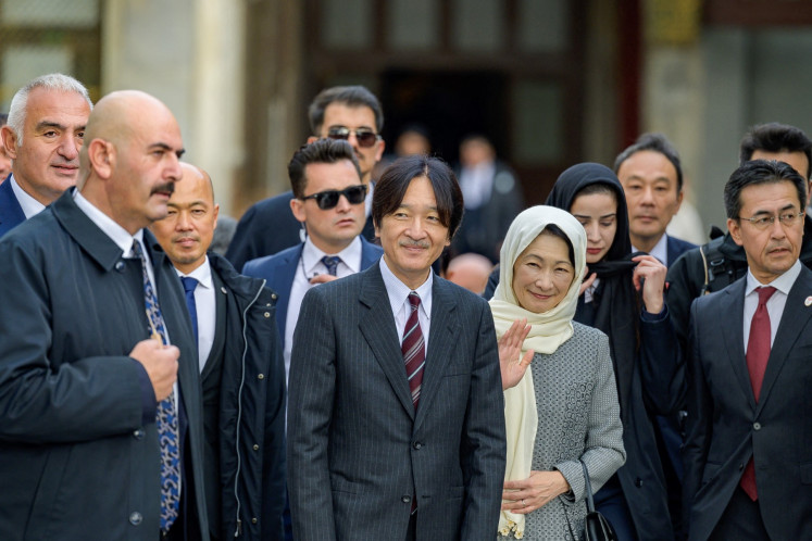 Japan's Crown Prince Fumihito (center) leaves with his wife Crown Princess Kiko (center, right) after visiting the Hagia Sofia Mosque in Istanbul, on Dec. 5, 2024.