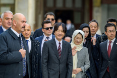 Japan's Crown Prince Fumihito (center) leaves with his wife Crown Princess Kiko (center, right) after visiting the Hagia Sofia Mosque in Istanbul, on Dec. 5, 2024.