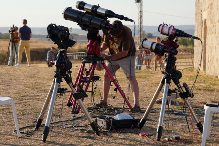 Researchers from San Francisco's Exploratorium museum carry out preparations for the global live broadcast of the upcoming August 12 total solar eclipse, in the abandoned village of Villalibado, near Burgos, northern Spain, on August 10, 2026. Around thirty scientists from the Exploratorium museum &ndash; NASA's official partner for live astronomical coverage &ndash; have set up three powerful telescopes in Villalibado to broadcast the eclipse live to 10 million people, choosing the village for its clear horizon, strong communications infrastructure, and location within the path of totality.