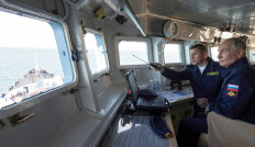 Russian President Vladimir Putin observes a military drill of the Pacific fleet on board the missile cruiser &ldquo;Varyag&rdquo;, in Russia's far eastern Sakhalin Region, Russia, August 12, 2026.